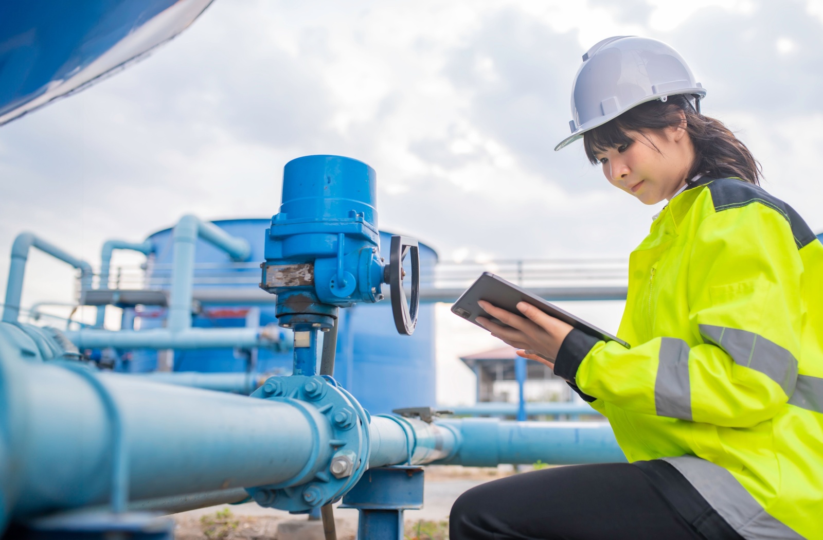 A water supply worker monitoring the city's fluoride-free water supply.